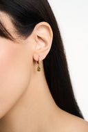 Birthstone huggie earrings in gold with teardrop gemstone charms displayed in multiple month colors. Dainty gold drop earrings with sparkling huggie hoops and pear cut birthstones, shown as a personalized gift for her, birthday earrings, minimalist gemstone earrings, and elegant birth month jewelry. Gold huggie hoop earrings with colorful birthstone drops for January, February, April, August, and October, styled as delicate everyday jewelry.

