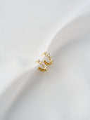 Gold baguette crystal hoop earrings product shot on white surface – AURA Jewelry