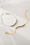 Multicolor gemstone bracelet in a slim tennis bracelet design with colorful round stones, styled as a dainty rainbow bracelet and gift for her. Elegant colorful stone bracelet for women, perfect as an everyday bracelet, birthday gift, or anniversary gift.